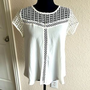 White top lace blouse.